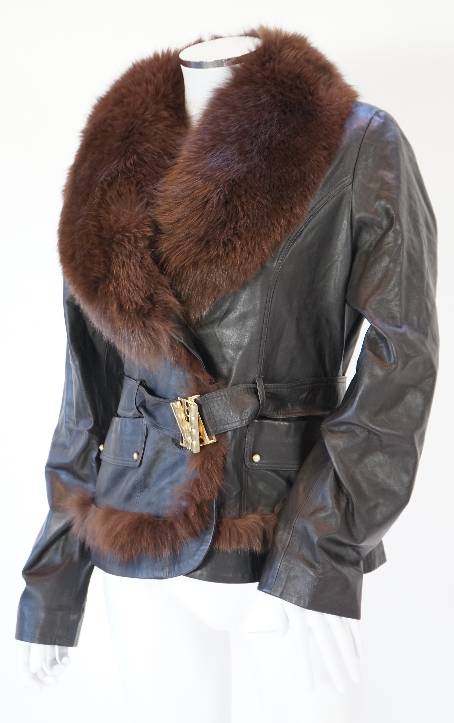 Two Desch lady's brown leather coats, one with fur collar the other with suede ruffle detail, both size XL